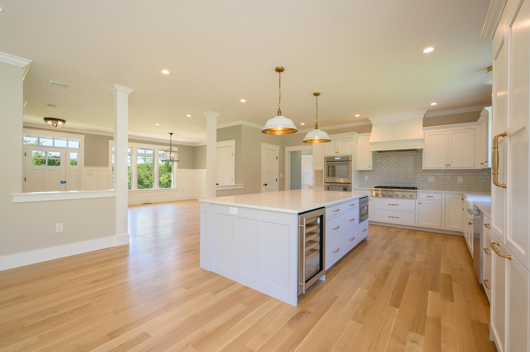 164 Breakwater Road Brewster, MA 02631 - Photo 11 of 57 a large kitchen with stainless steel appliances a large counter top a sink a refrigerator and a stove