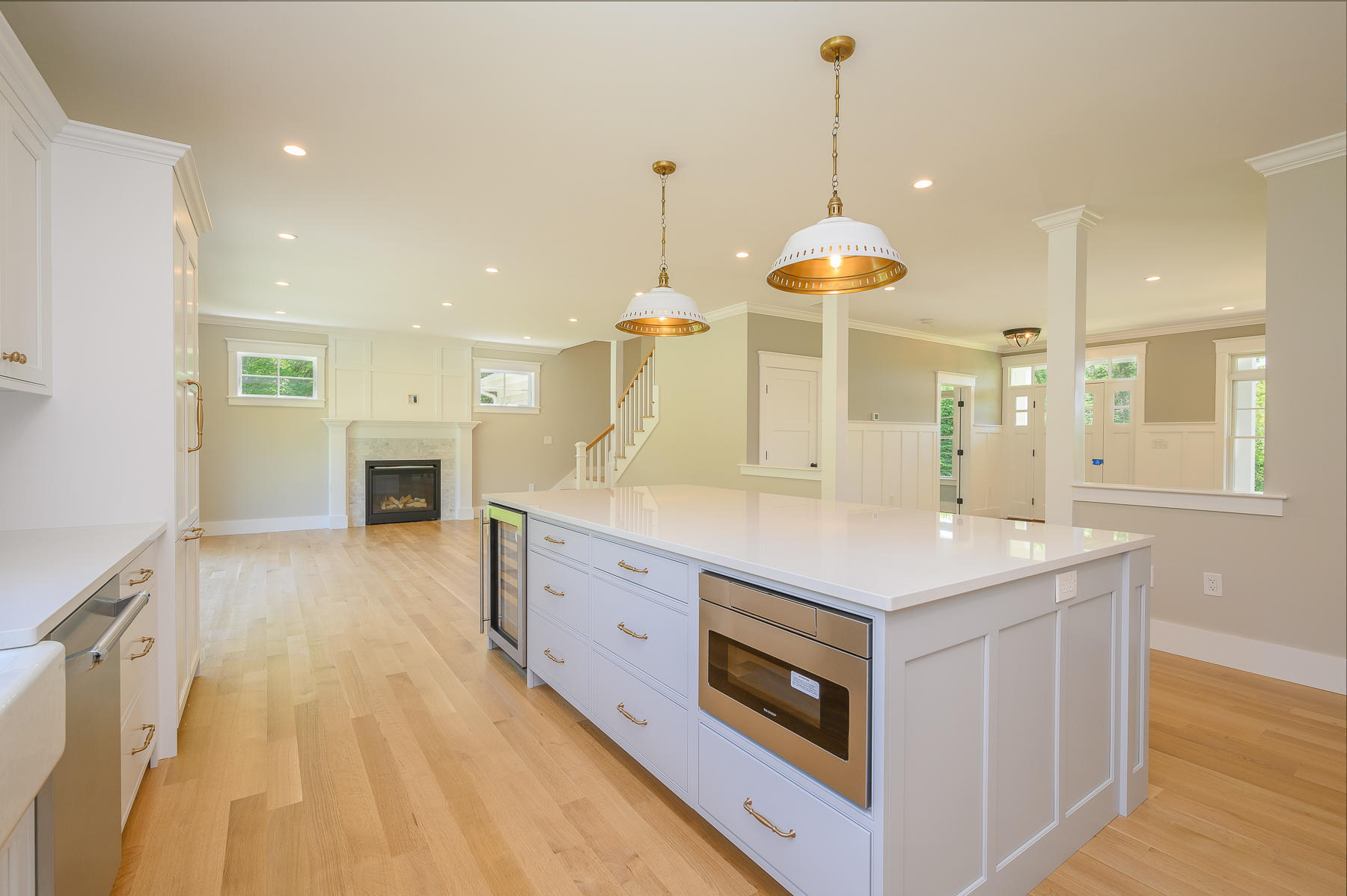 164 Breakwater Road Brewster, MA 02631 - Photo 12 of 57 a kitchen with a sink stove and wooden floor