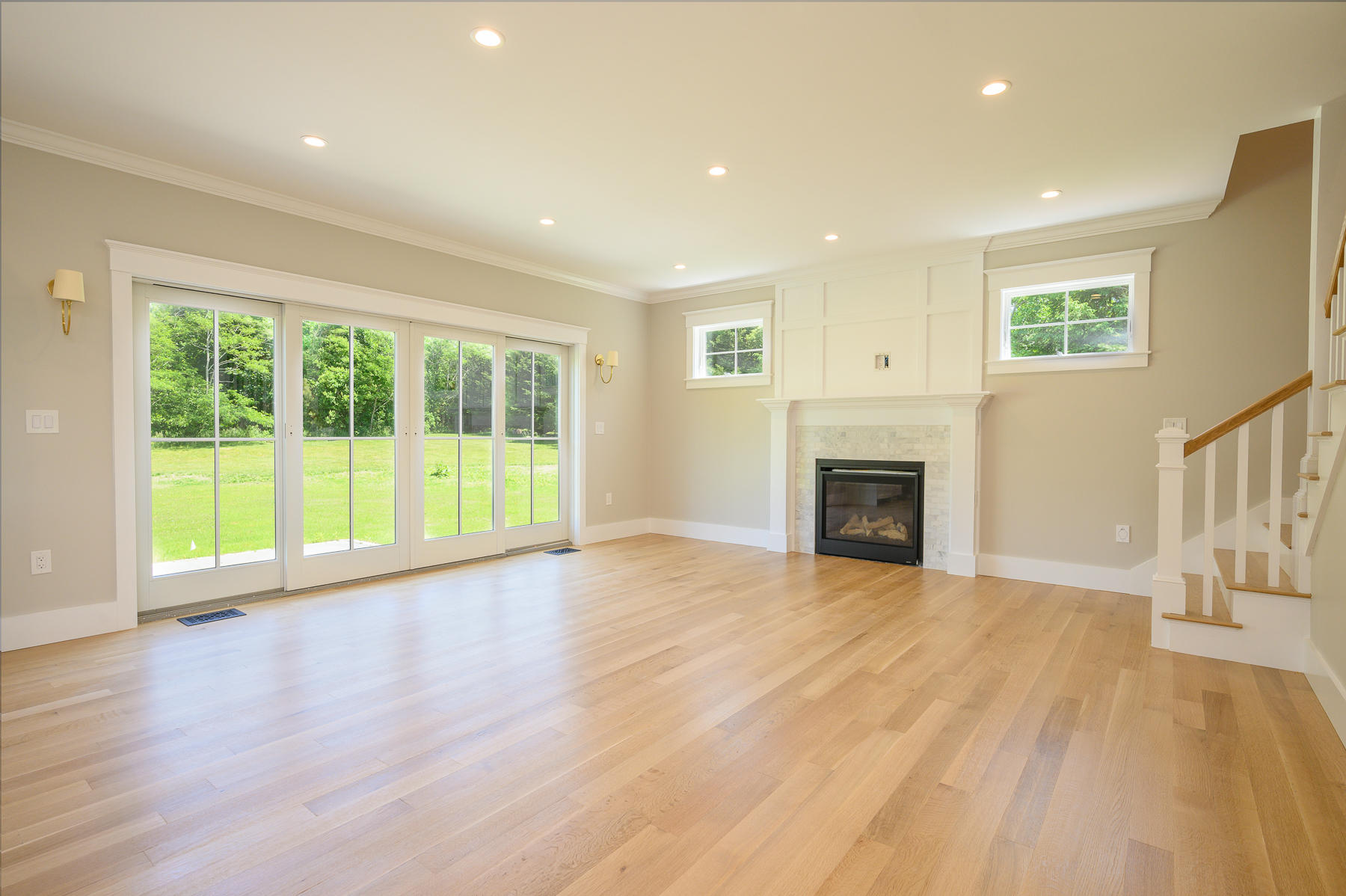 164 Breakwater Road Brewster, MA 02631 - Photo 16 of 57 a view of an empty room with wooden floor and a window