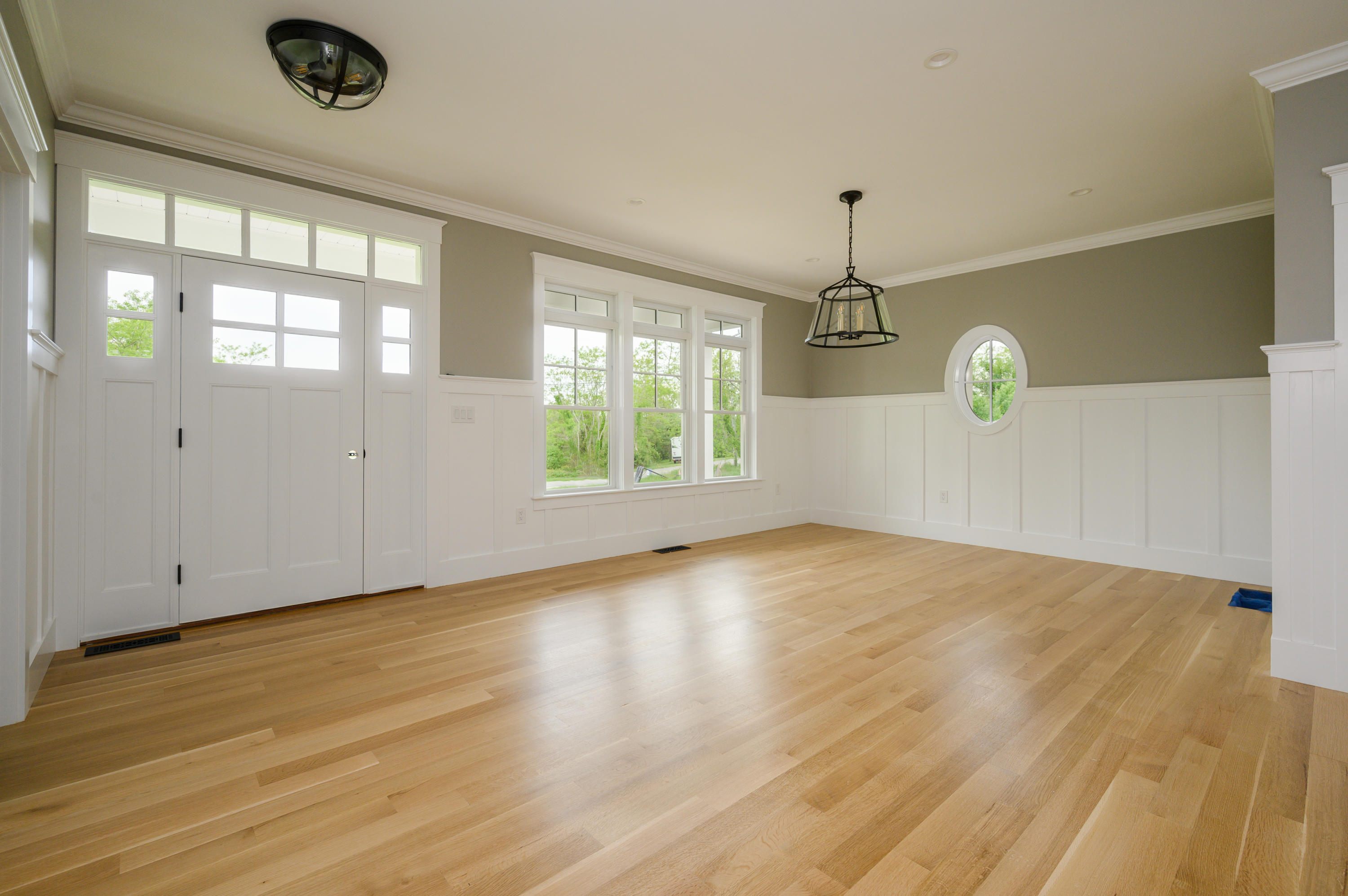 164 Breakwater Road Brewster, MA 02631 - Photo 18 of 57 a view of an empty room with window and wooden floor