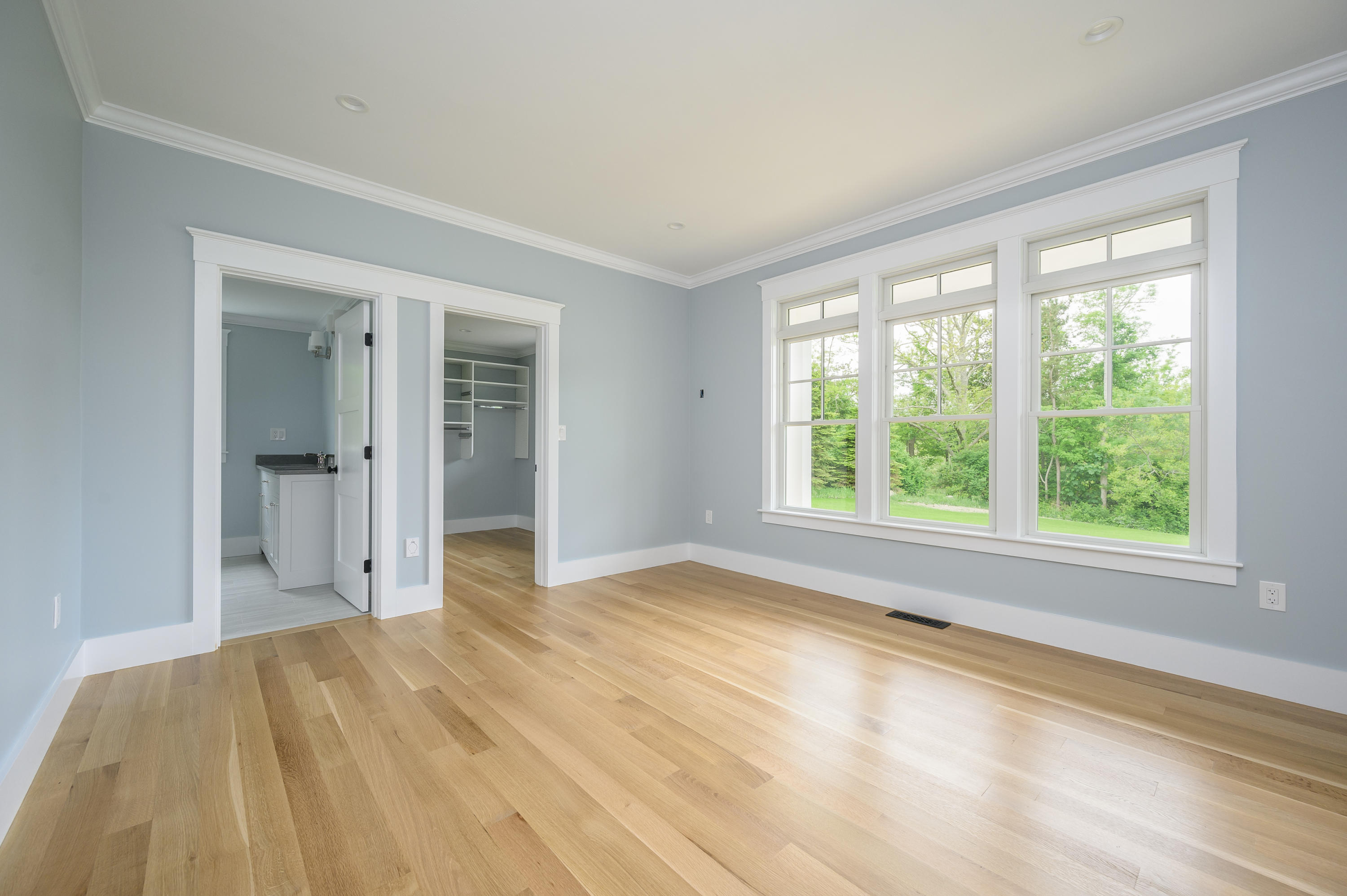 164 Breakwater Road Brewster, MA 02631 - Photo 21 of 57 a view of empty room with wooden floor and fan