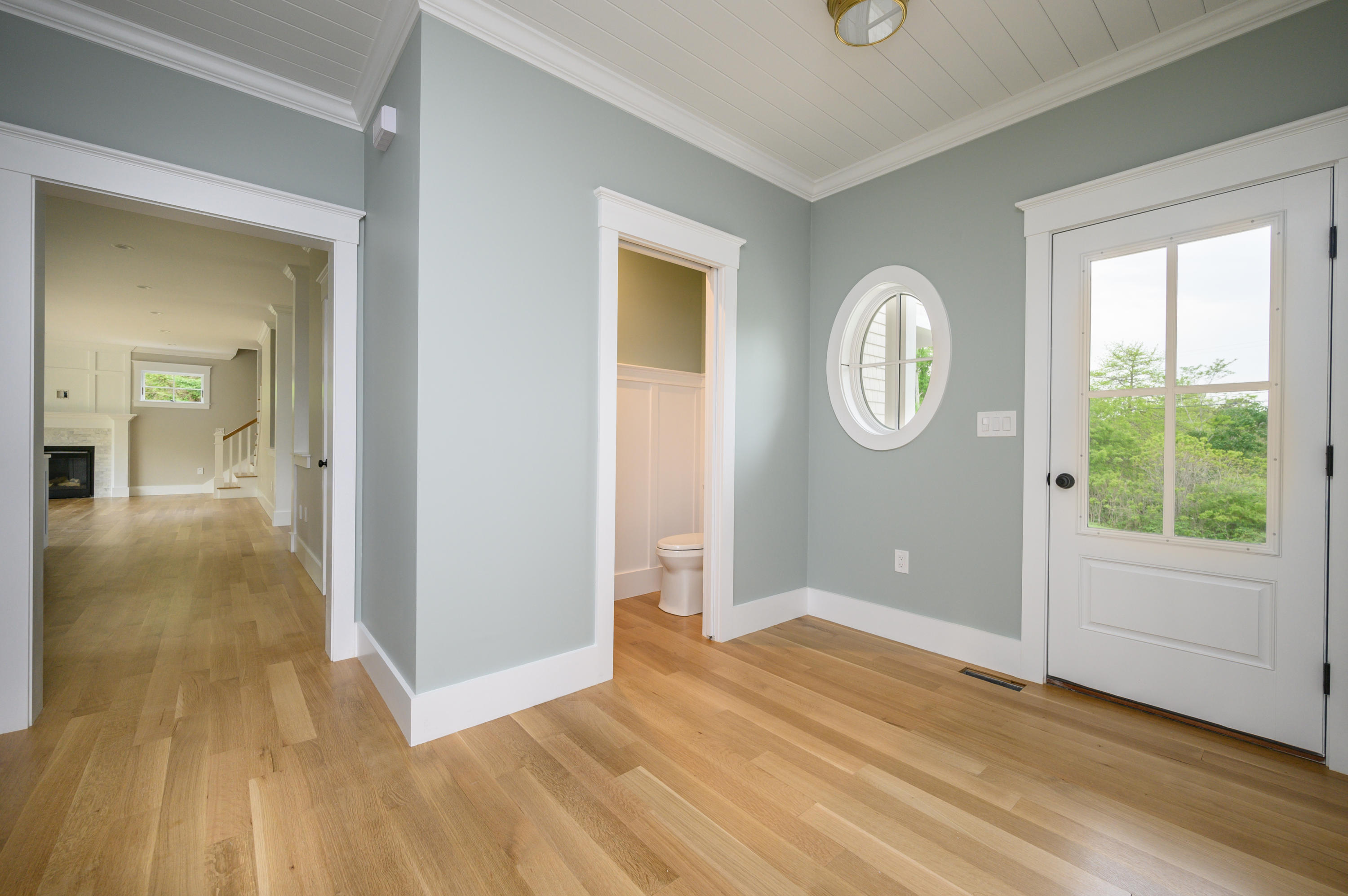 164 Breakwater Road Brewster, MA 02631 - Photo 25 of 57 a view of room with window and wooden floor