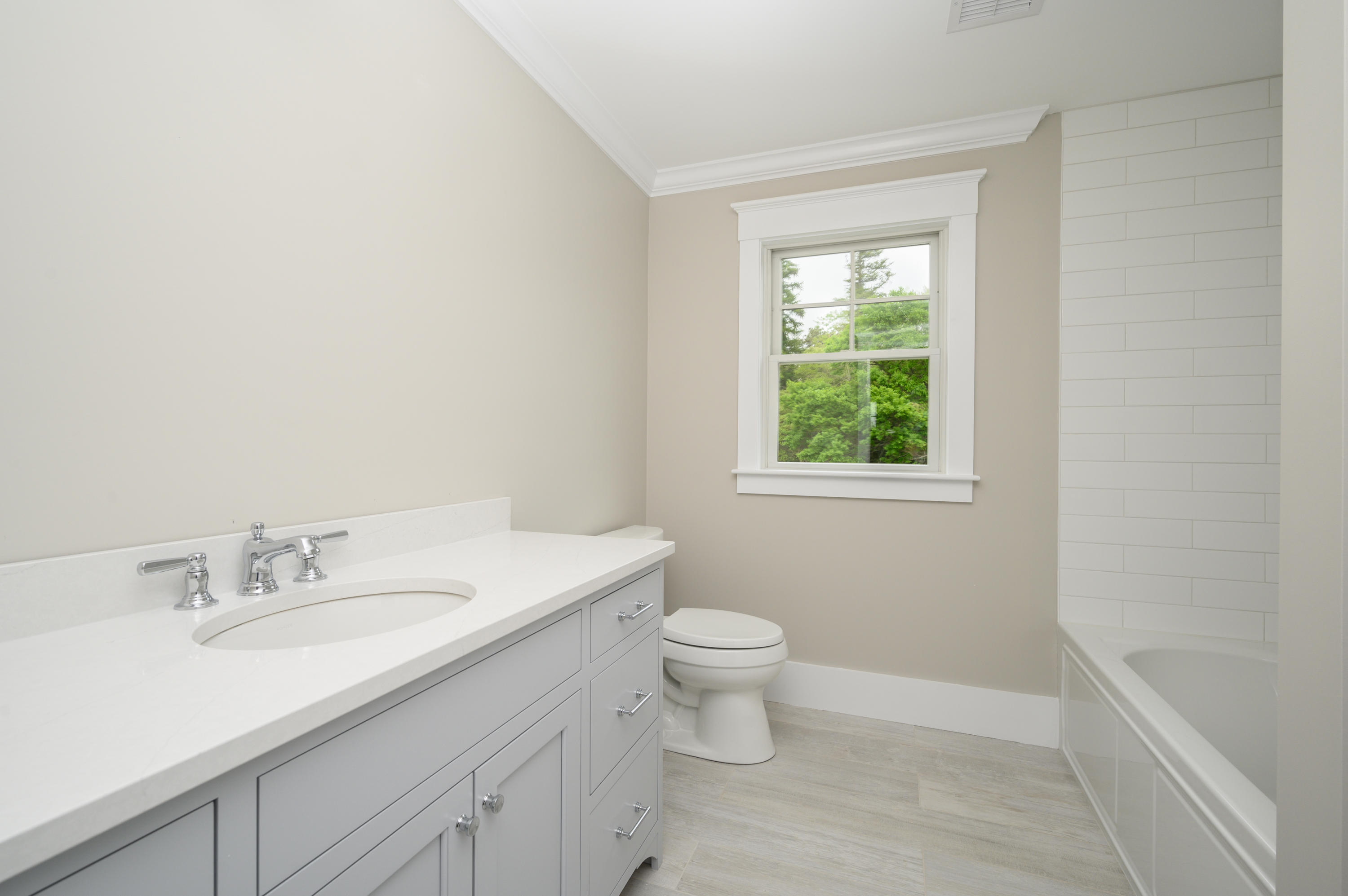 164 Breakwater Road Brewster, MA 02631 - Photo 31 of 57 a bathroom with a sink toilet and a window