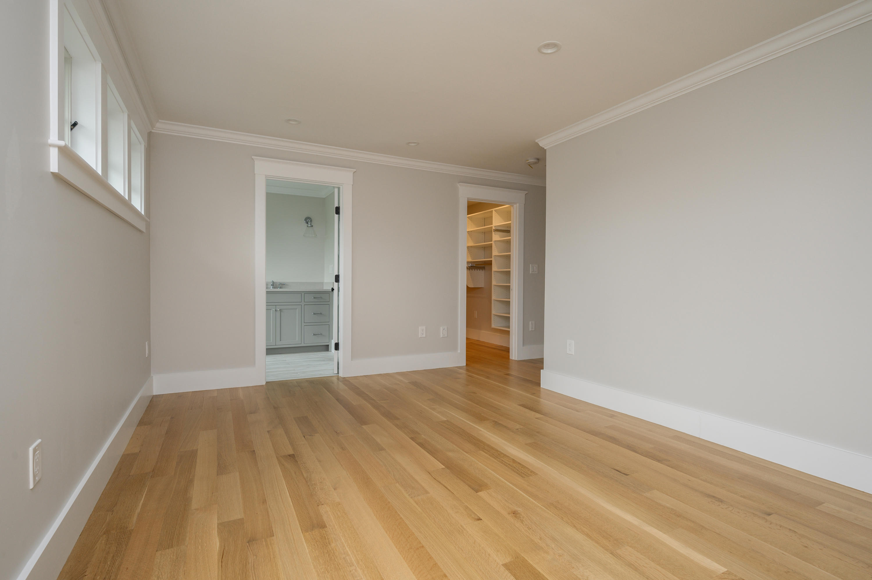 164 Breakwater Road Brewster, MA 02631 - Photo 38 of 57 a view of an empty room and wooden floor