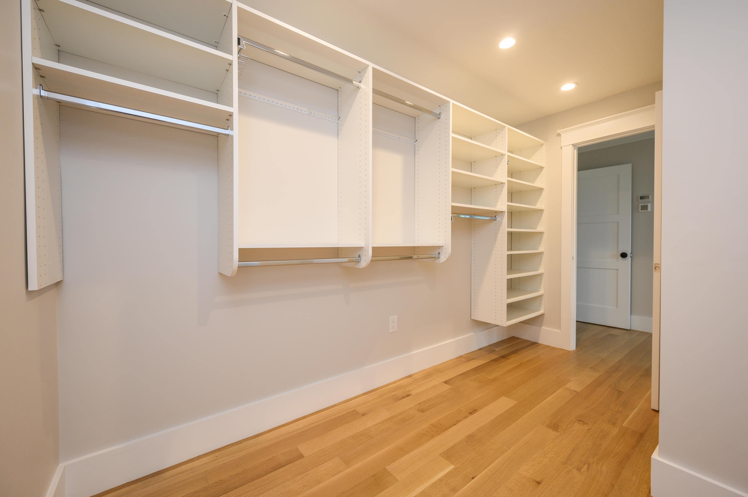 164 Breakwater Road Brewster, MA 02631 - Photo 39 of 57 a view of an empty room with wooden floor and closet