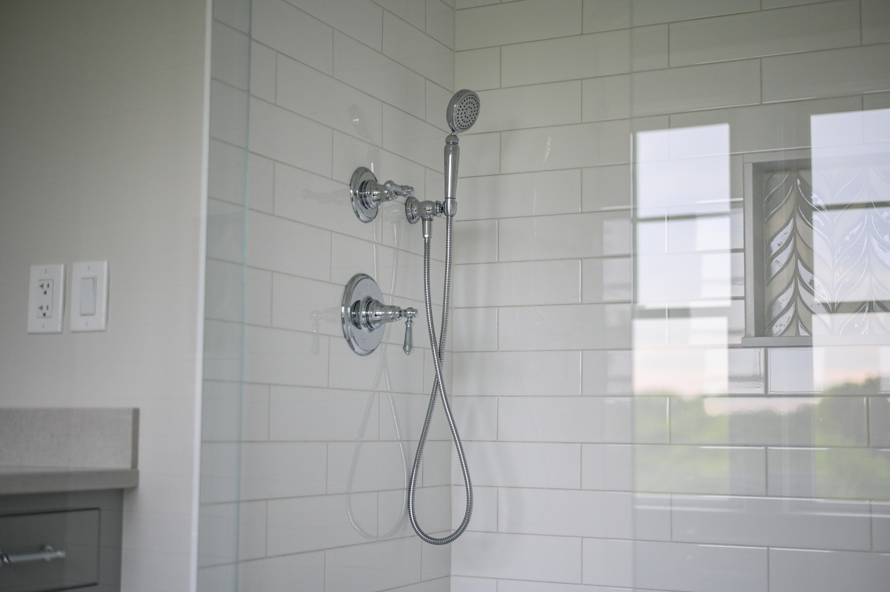 164 Breakwater Road Brewster, MA 02631 - Photo 42 of 57 a bathroom with a glass shower