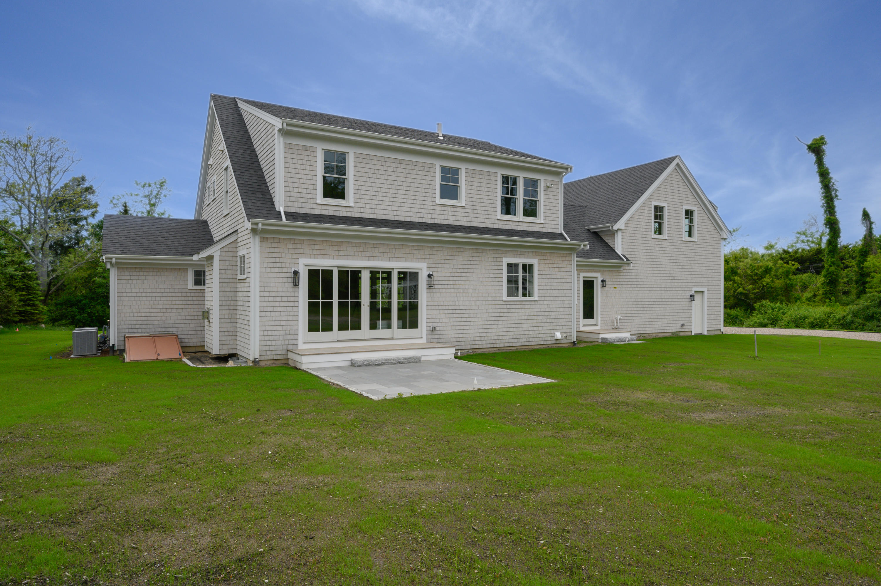 164 Breakwater Road Brewster, MA 02631 - Photo 44 of 57 a front view of house with yard and green space
