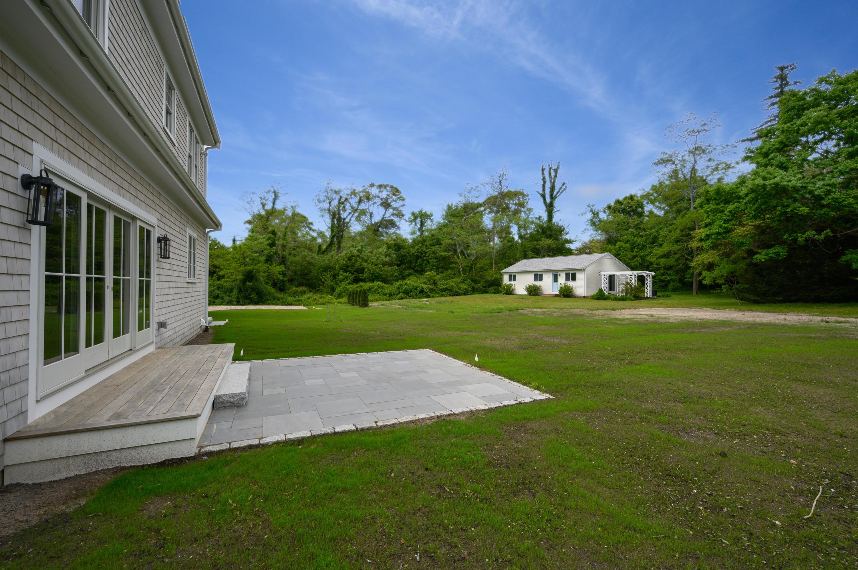 164 Breakwater Road Brewster, MA 02631 - Photo 45 of 57 a view of a house with a yard