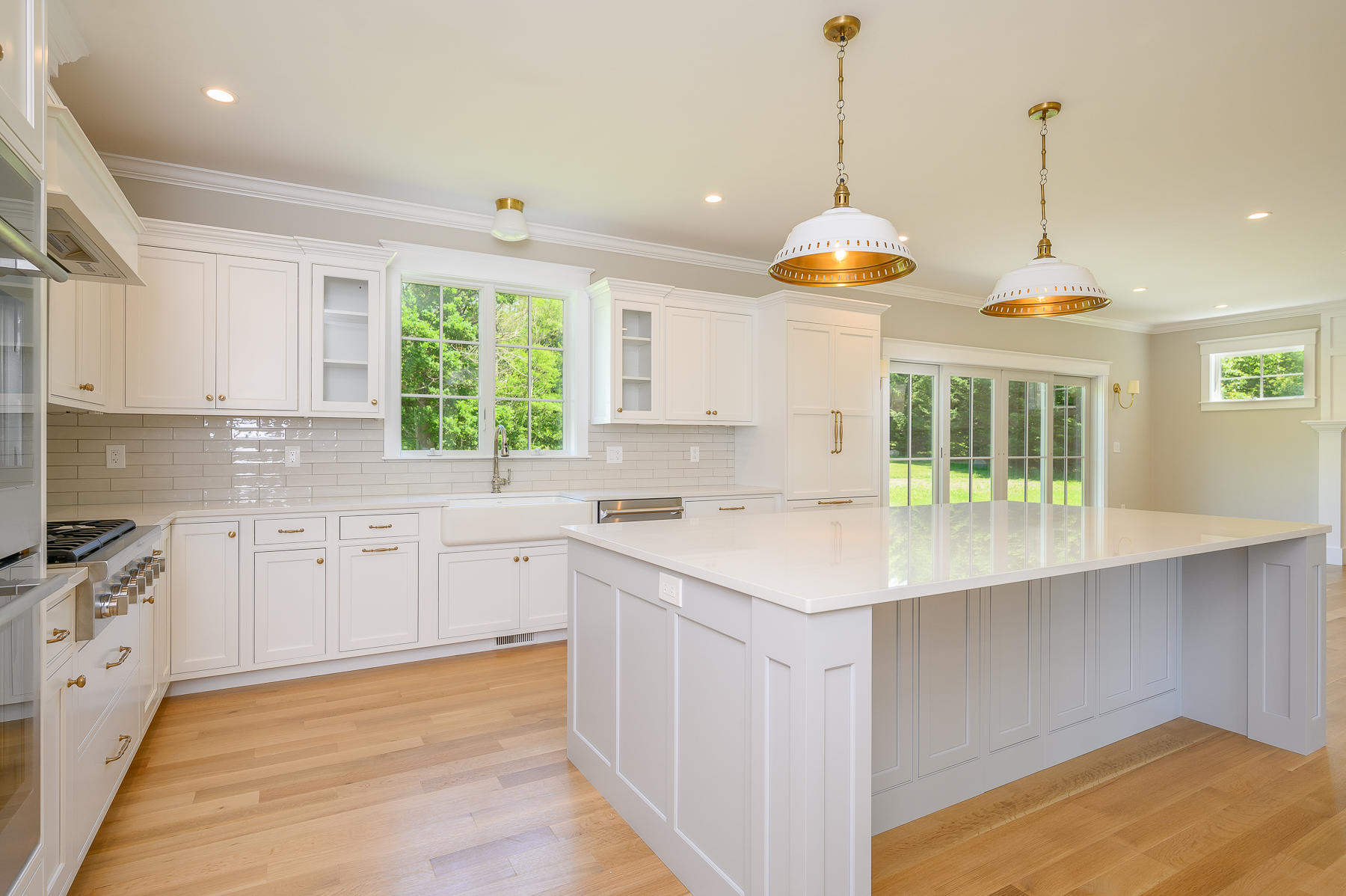 164 Breakwater Road Brewster, MA 02631 - Photo 6 of 57 a kitchen with a sink stove and cabinets