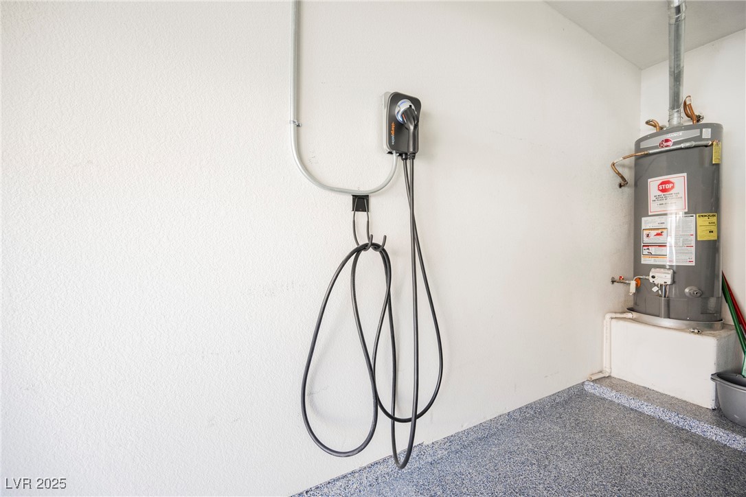7625 Rolling View Drive, Unit 202 Las Vegas, NV 89149 - Photo 21 of 28 Utility room featuring gas water heater