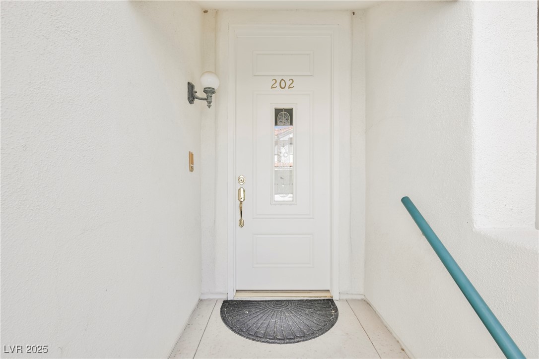 7625 Rolling View Drive, Unit 202 Las Vegas, NV 89149 - Photo 28 of 28 Property entrance with stucco siding