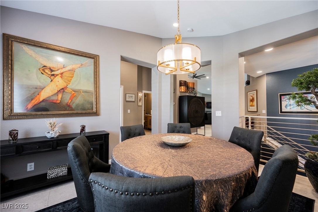 7625 Rolling View Drive, Unit 202 Las Vegas, NV 89149 - Photo 6 of 28 Dining space featuring recessed lighting and a chandelier