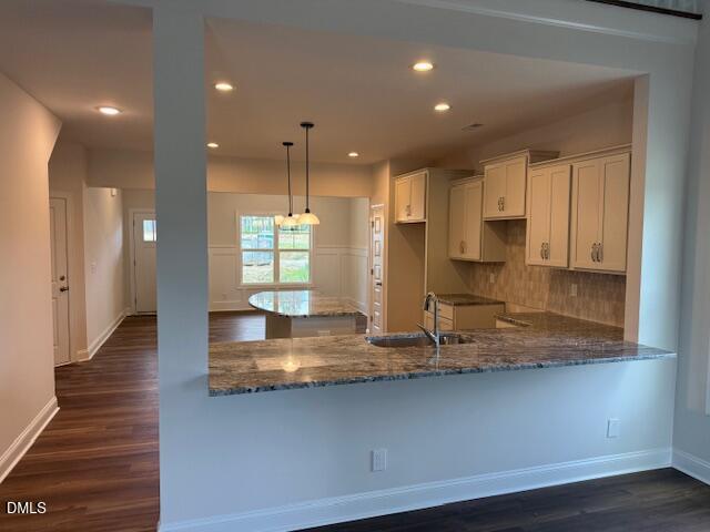 204 North Rabbit Run Drive Smithfield, NC 27577 - Photo 4 of 19 a kitchen with kitchen island granite countertop a sink and a counter top space