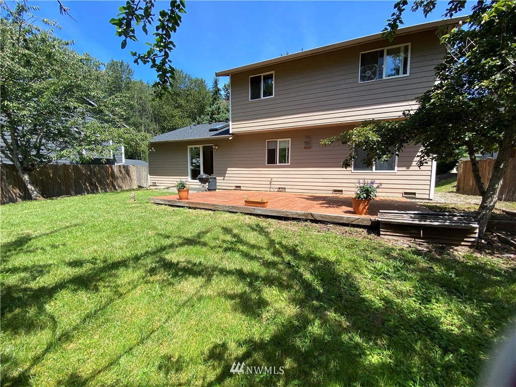 22412 15th Place West Bothell, WA 98021 - Photo 22 of 25 a view of a house with backyard and sitting area