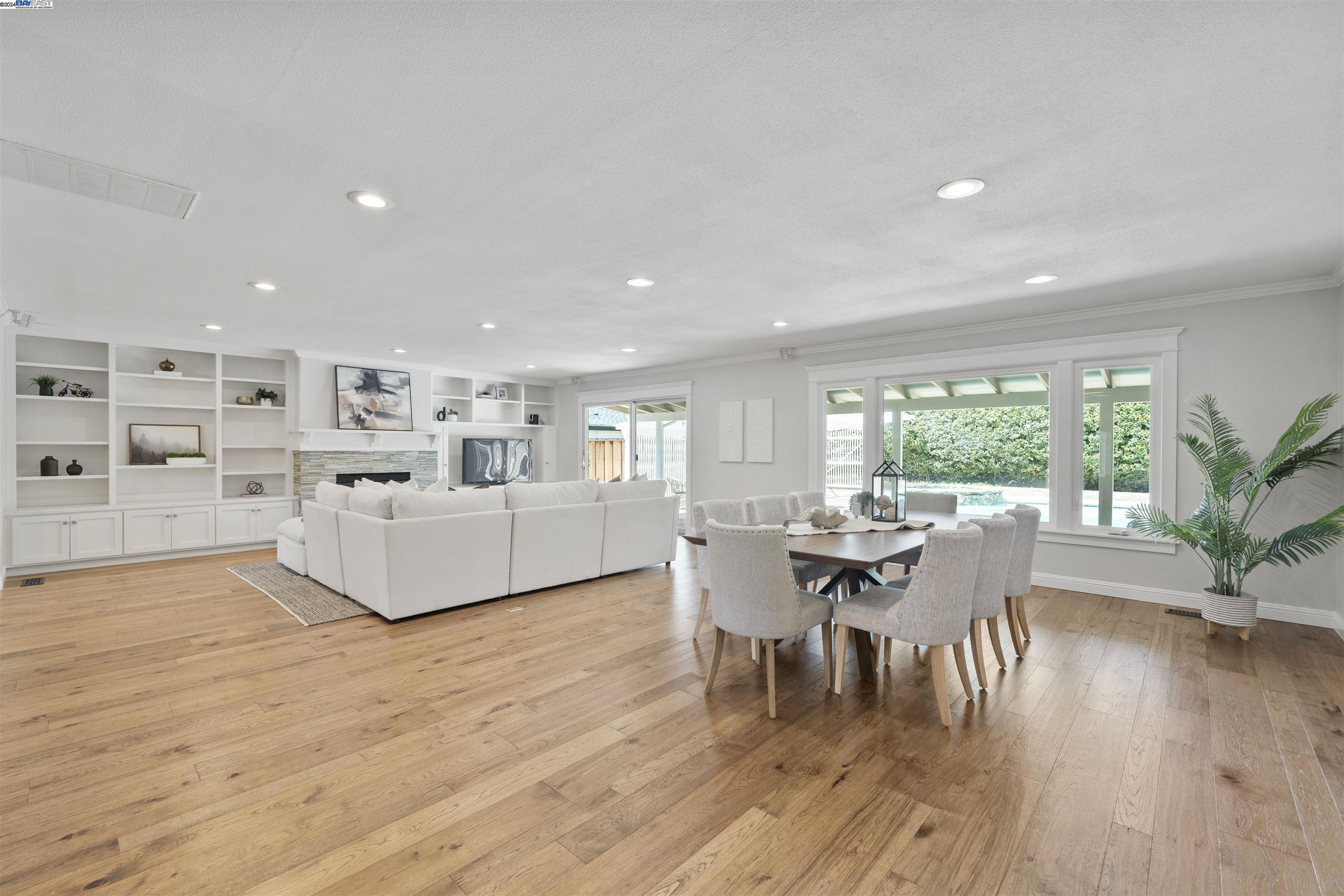 2369 Castillejo Way Fremont, CA 94539 - Photo 1 of 1 a living room with furniture and a wooden floor