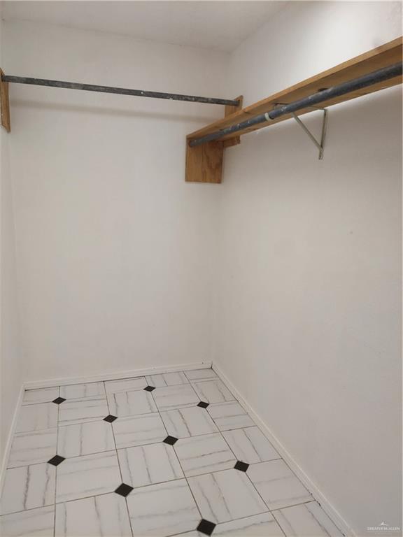 115 Breyfogle Road Palmview, TX 78572 - Photo 15 of 31 a view of an empty walk in closet