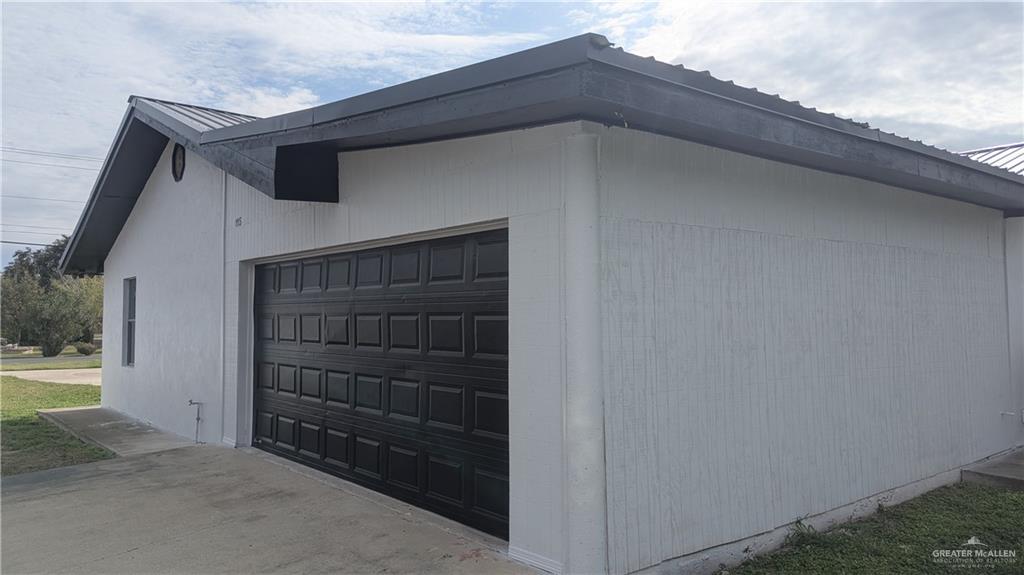 115 Breyfogle Road Palmview, TX 78572 - Photo 23 of 31 a view of wooden door and entryway