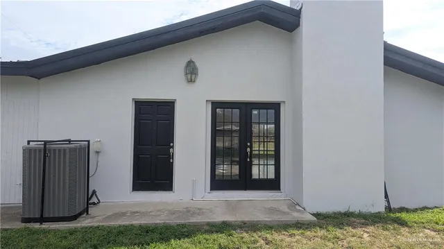 a front view of a house with garage