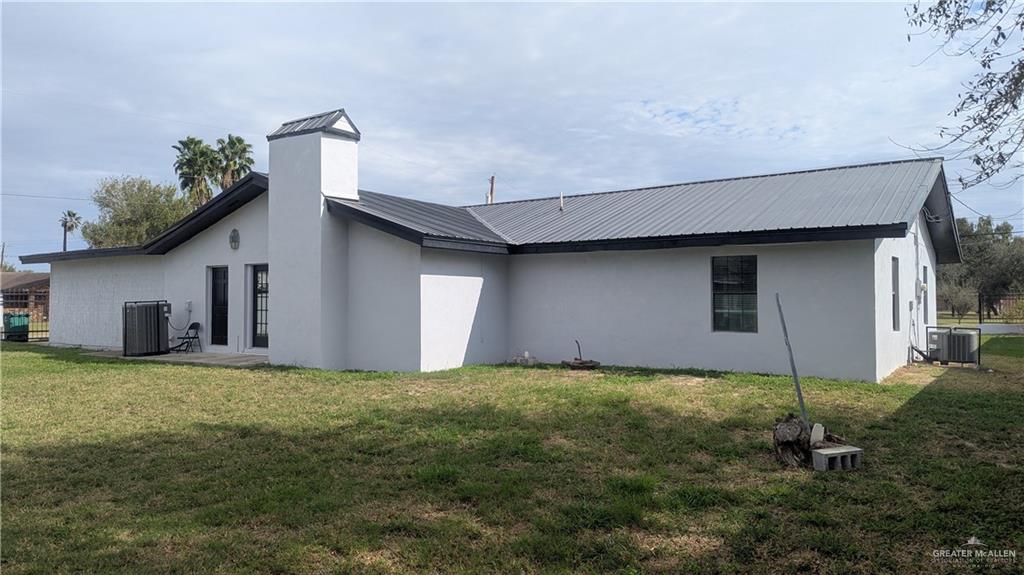 115 Breyfogle Road Palmview, TX 78572 - Photo 28 of 31 a view of a house with a yard