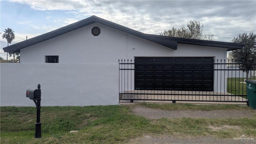 115 Breyfogle Road Palmview, TX 78572 - Photo 29 of 31 a front view of a house with garage