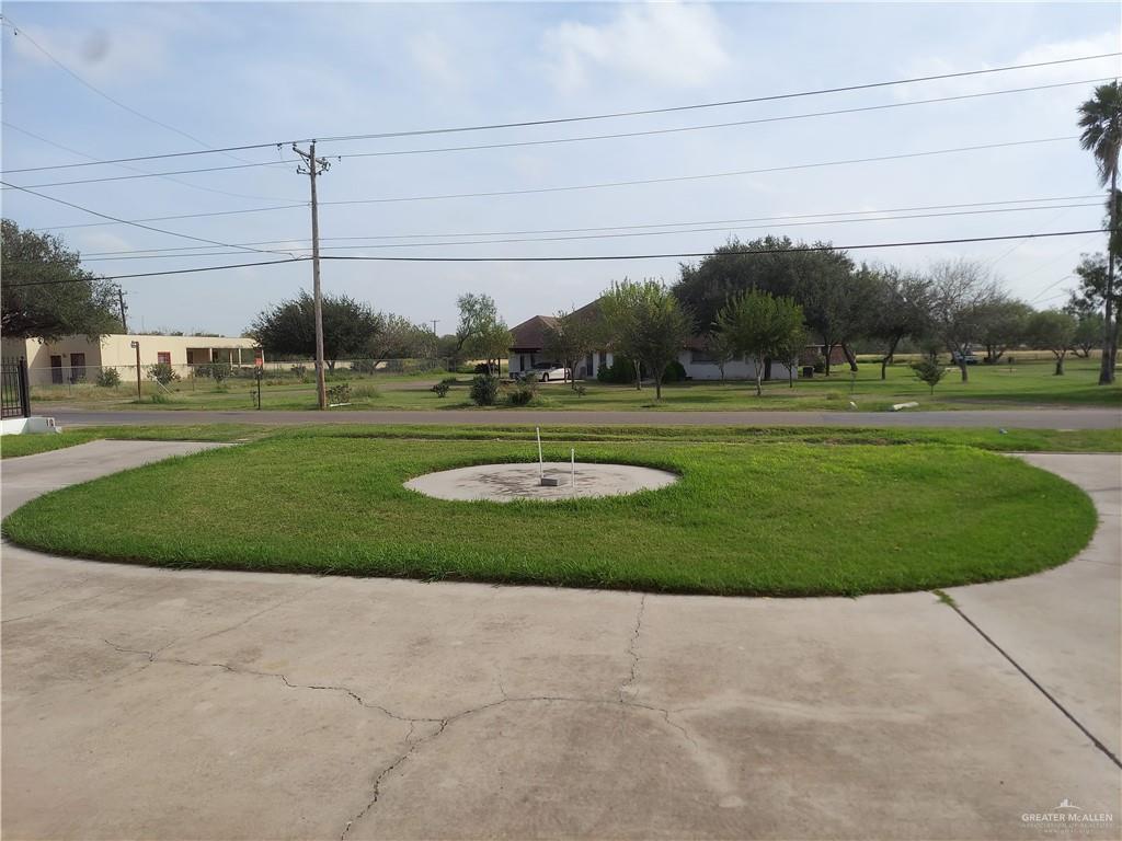 115 Breyfogle Road Palmview, TX 78572 - Photo 4 of 31 a view of a golf course with a play ground