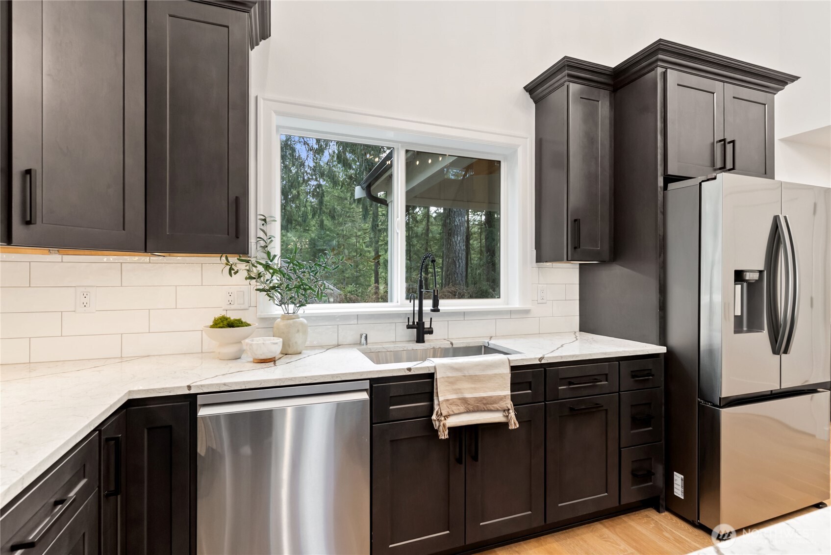 31 East Rhododendron Court Union, WA 98592 - Photo 13 of 38 a kitchen with a sink a refrigerator and a sink