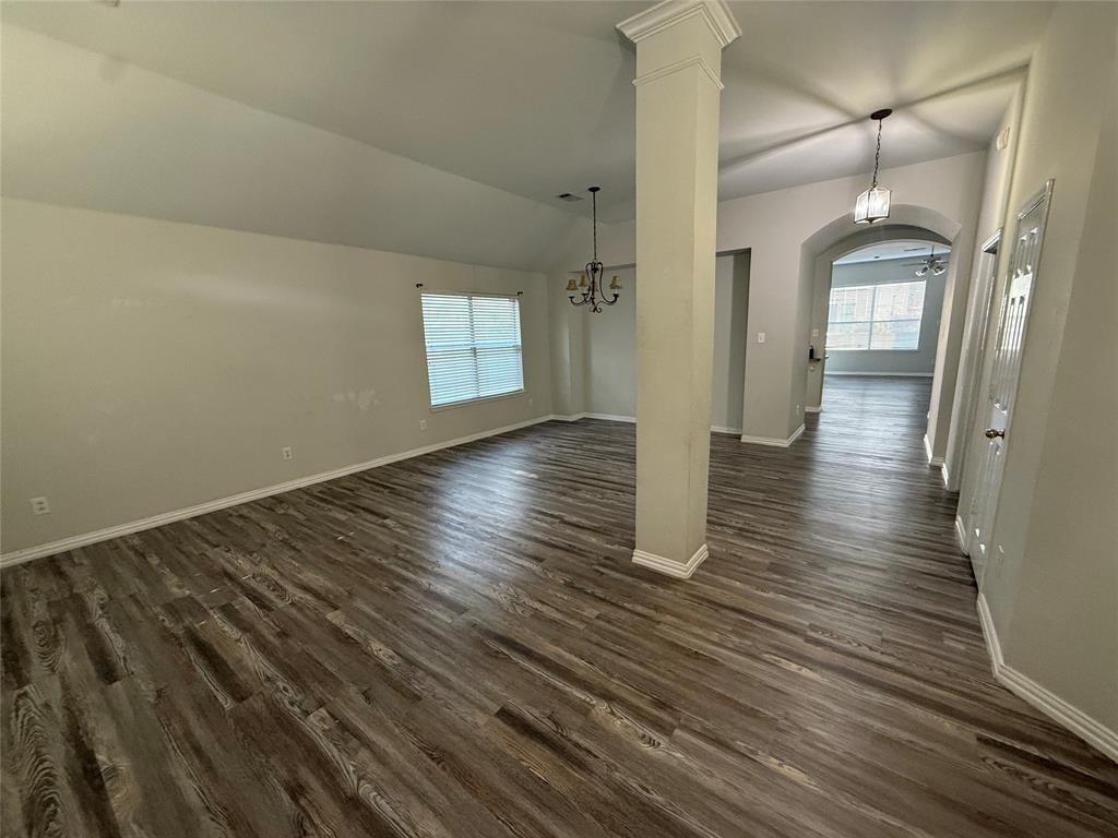 13252 Ridgepointe Road Fort Worth, TX 76244 - Photo 2 of 9 a view of empty room with wooden floor