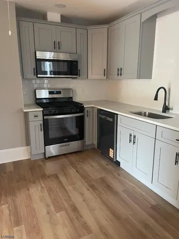 a view of a swimming pool with an outdoor seating