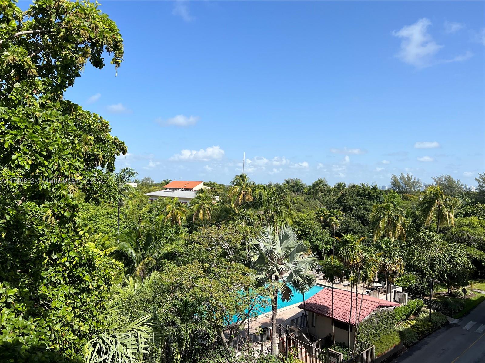 101 Crandon Boulevard, Unit 474 Key Biscayne, FL 33149 - Photo 1 of 9 an aerial view of a house with a yard
