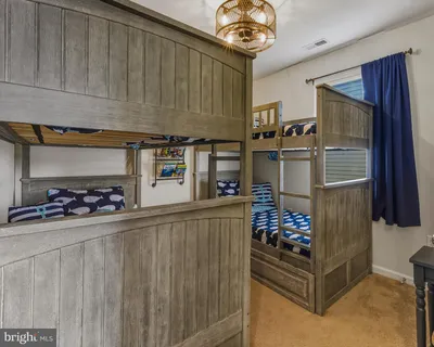 a kitchen with stainless steel appliances a refrigerator and a stove