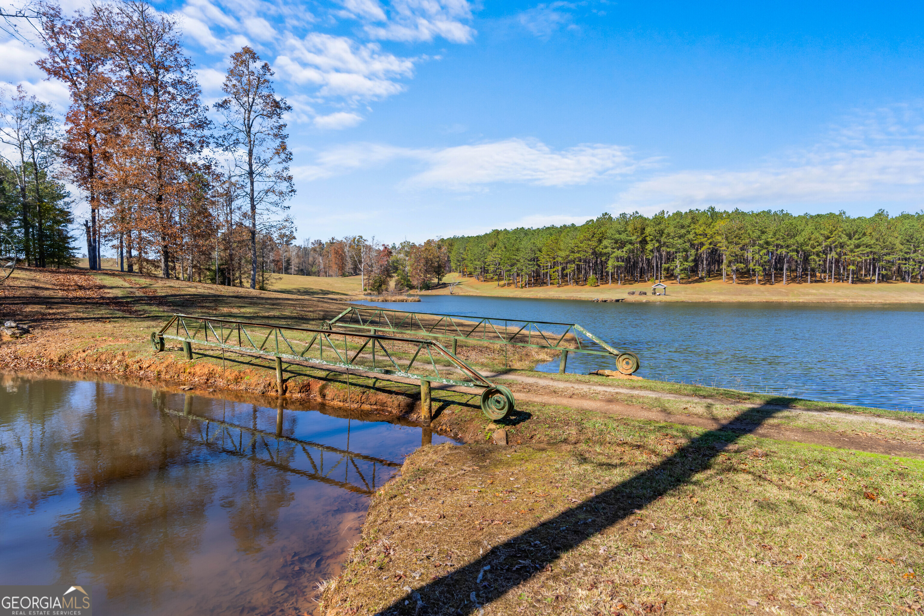 1390 Walker Road Madison, GA 30650 - Photo 27 of 64 a view of a lake with a mountain