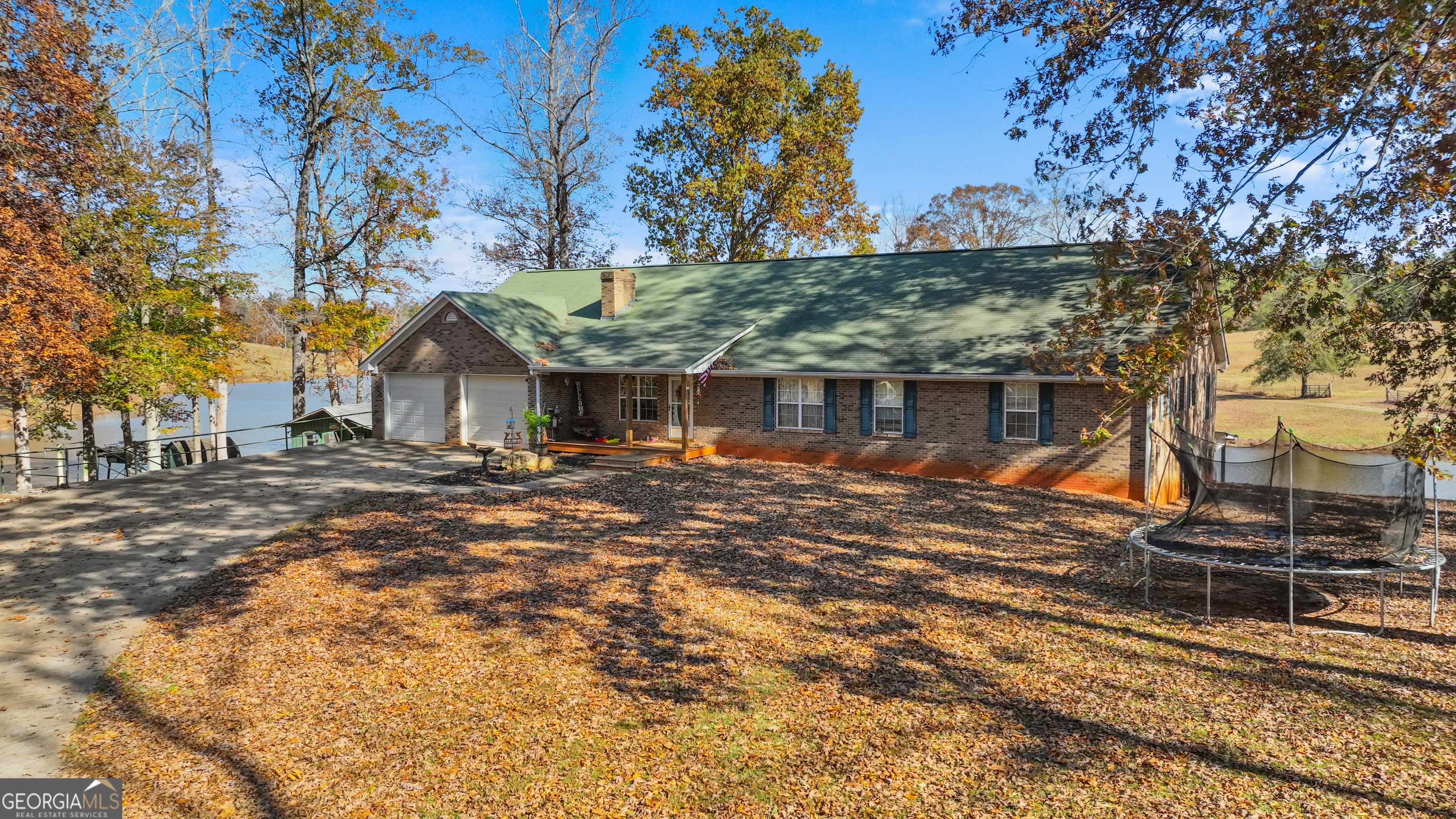 1390 Walker Road Madison, GA 30650 - Photo 51 of 64 a view of a house with backyard