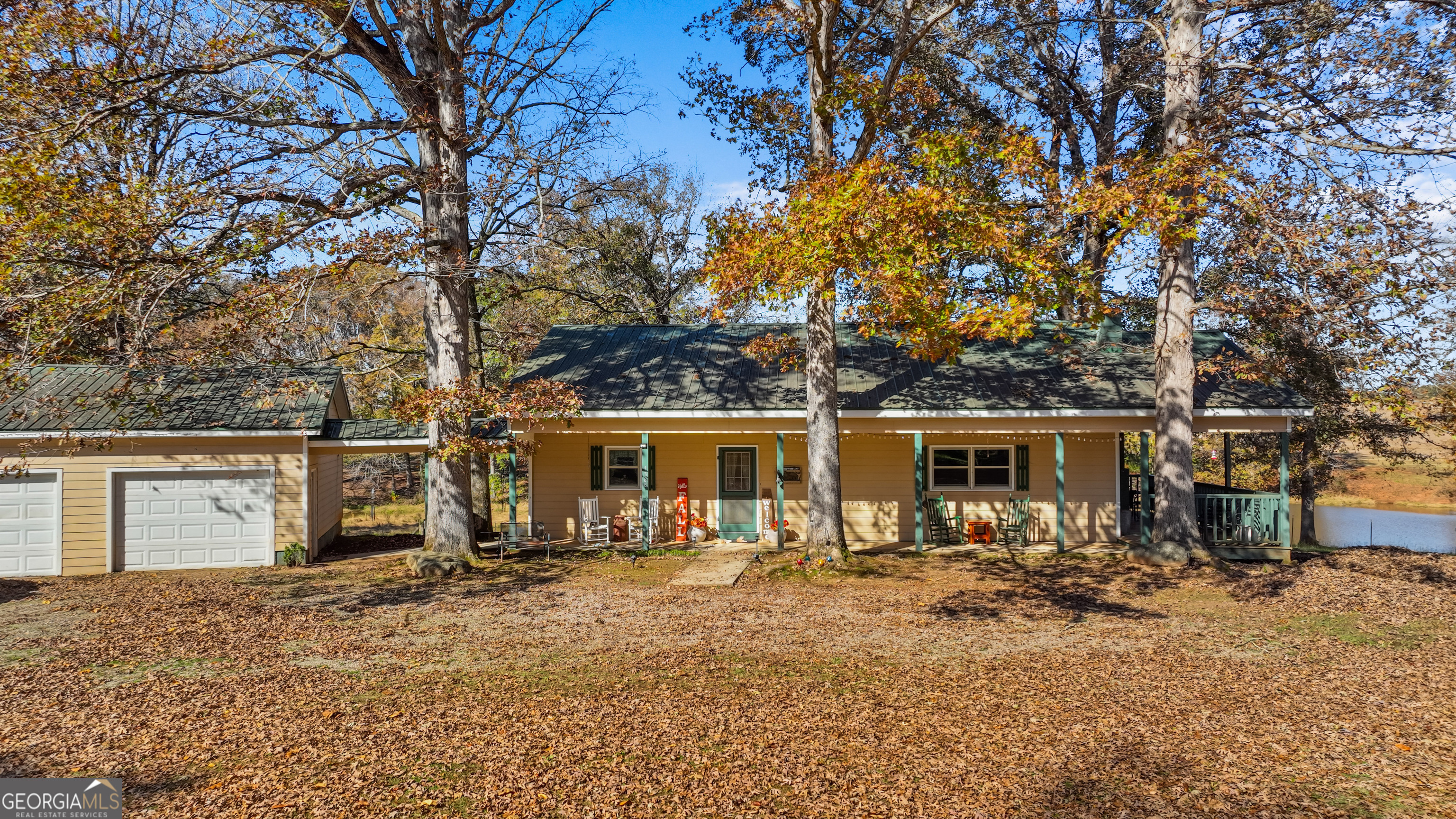 1390 Walker Road Madison, GA 30650 - Photo 58 of 64 a view of a yard with a large tree