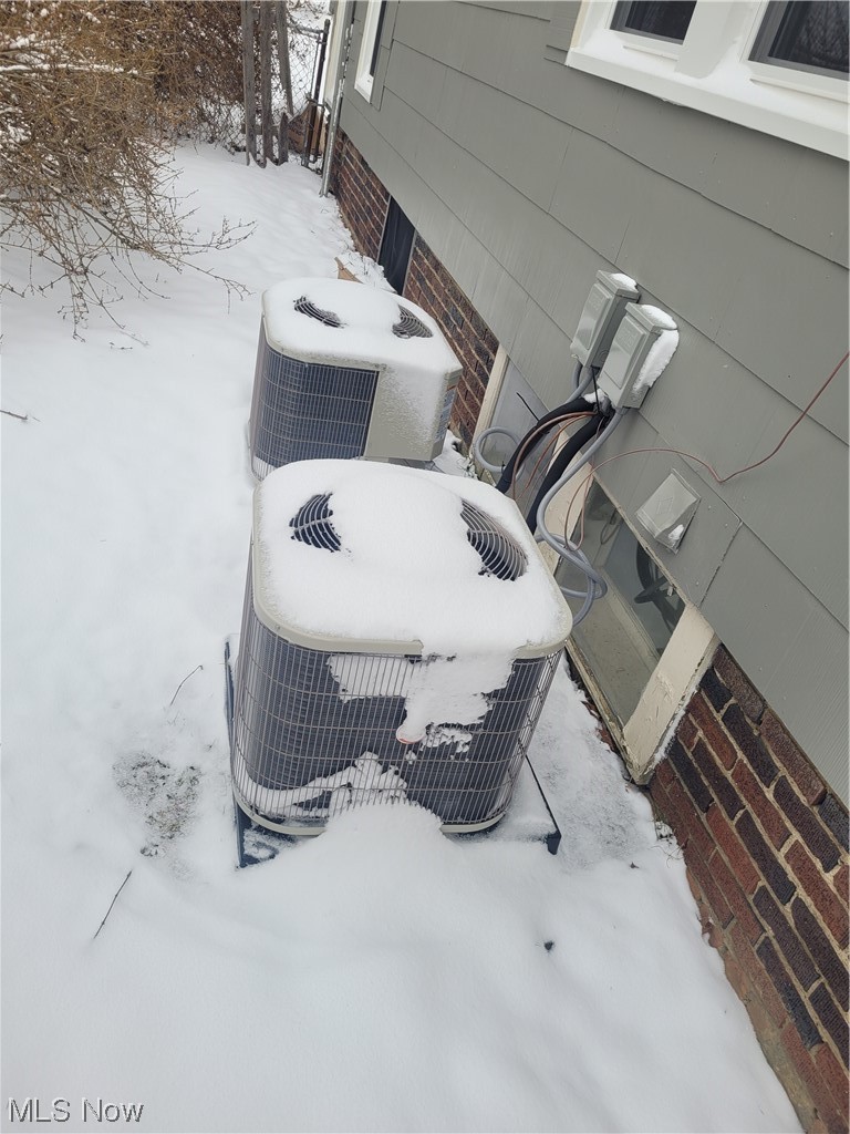 1343 Churchill Road Lyndhurst, OH 44124 - Photo 7 of 9 Details with central AC unit