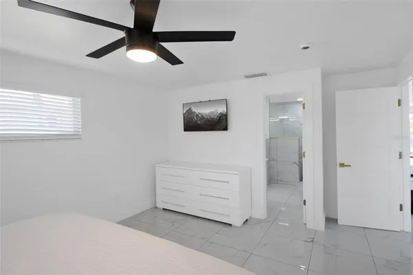 a utility room with cabinets