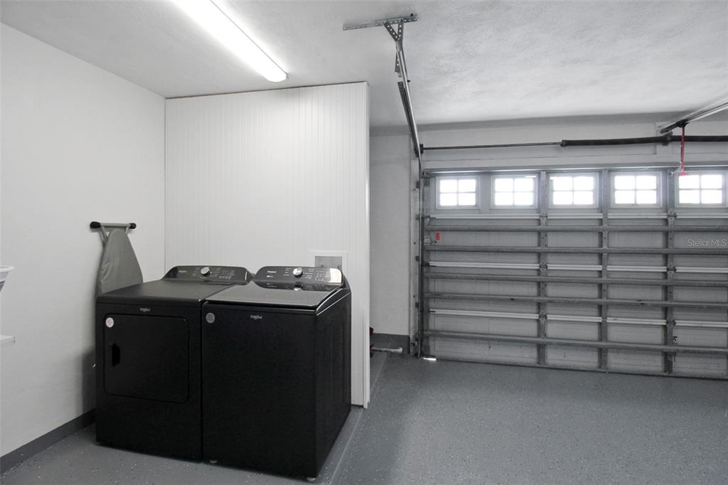 945 Bal Harbor Boulevard Punta Gorda, FL 33950 - Photo 29 of 71 a utility room with cabinets