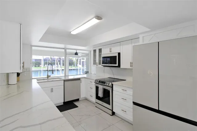 a living room with furniture and a chair