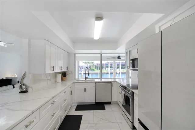 a bed room with a bed and a window