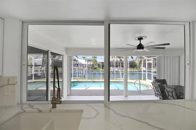 a bedroom with a bed and white walls