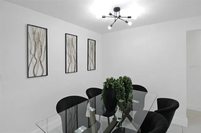 a bedroom with a bed and a ceiling fan