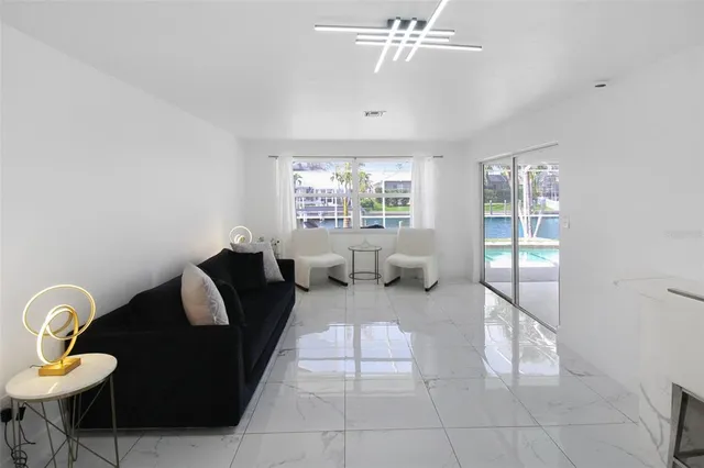 a living room view with furniture and garden