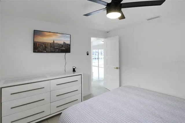 a view of a house with a backyard porch and sitting area