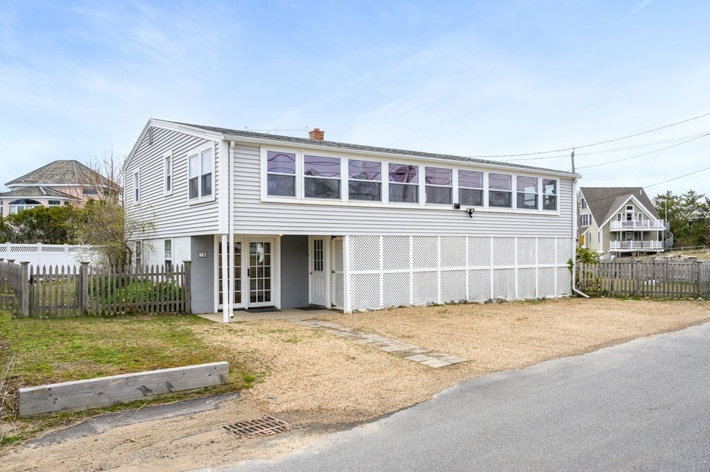 78 Southern Boulevard Newbury, MA 01951 - Photo 1 of 35 a front view of a house with a yard