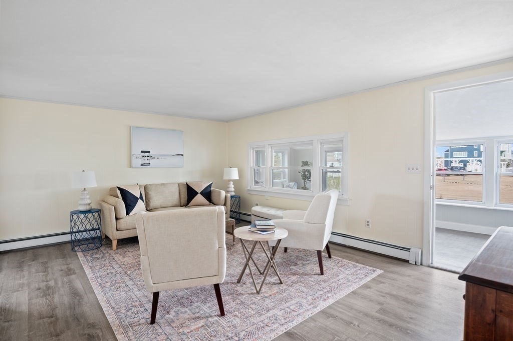 78 Southern Boulevard Newbury, MA 01951 - Photo 21 of 35 a living room with furniture and a wooden floor