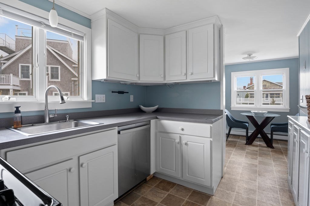 78 Southern Boulevard Newbury, MA 01951 - Photo 26 of 35 a kitchen with cabinets appliances a sink and furniture