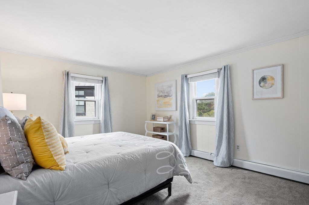 78 Southern Boulevard Newbury, MA 01951 - Photo 27 of 35 a bedroom with a bed and a couch
