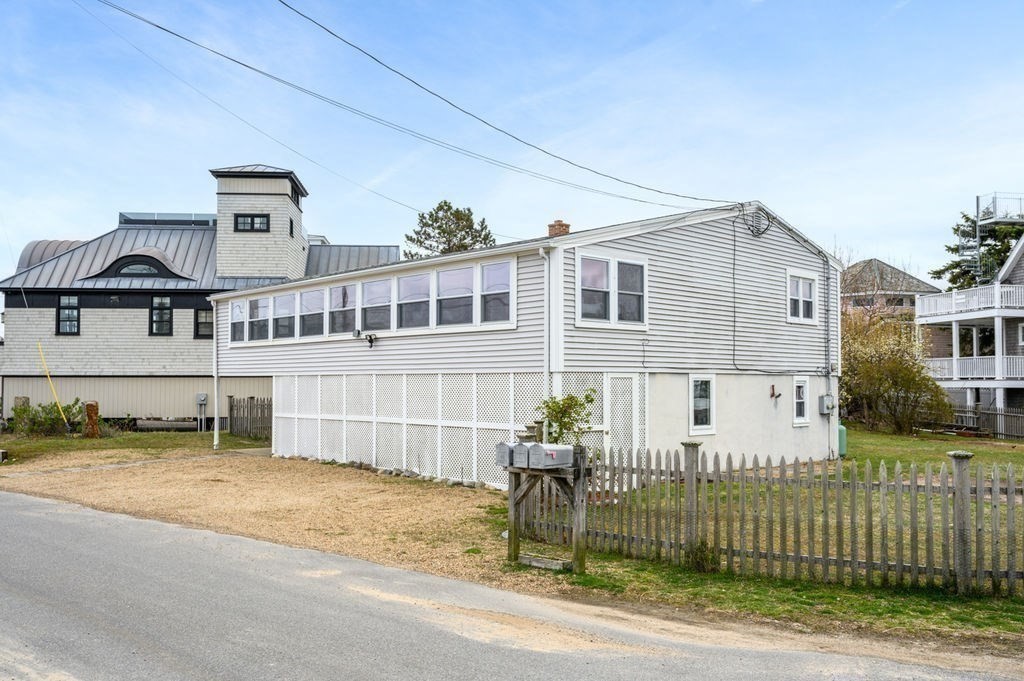 78 Southern Boulevard Newbury, MA 01951 - Photo 7 of 35 a front view of a house with a yard