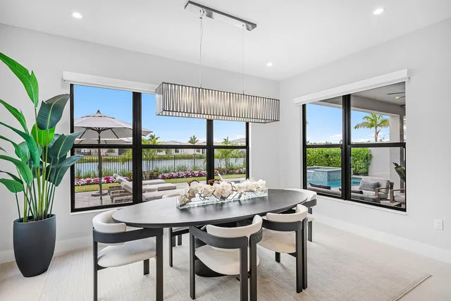 a view of staircase with railing and white walls