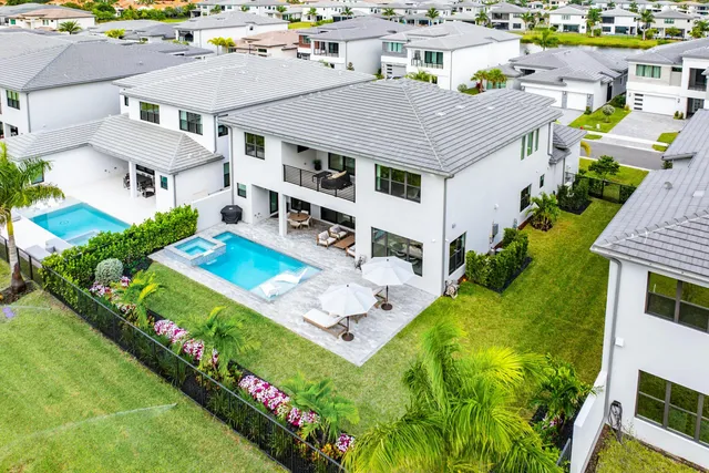 a bedroom with a bed and a chair