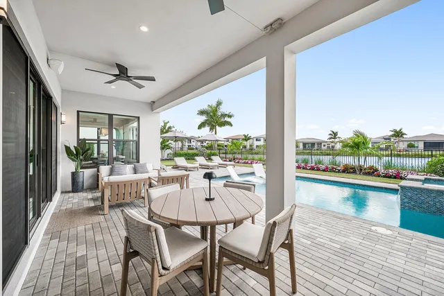 an aerial view of a house with garden space and street view